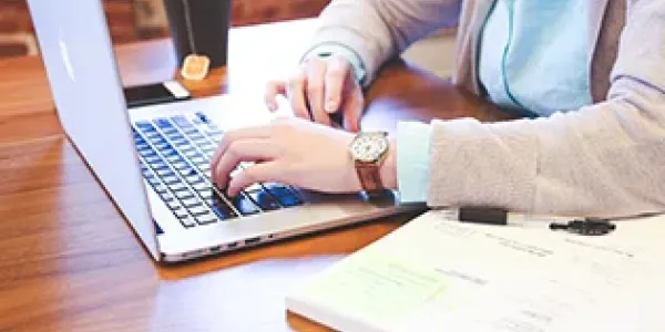 A person on a laptop